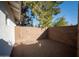 Enclosed backyard with brick paved ground, bordered by a block wall for privacy at 15440 N 54Th St, Scottsdale, AZ 85254