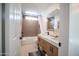 Bathroom with double sink vanity, shower with tub, and modern fixtures at 15440 N 54Th St, Scottsdale, AZ 85254