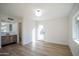 Bright bedroom with an en suite bathroom, white walls, and a door to the outside at 15440 N 54Th St, Scottsdale, AZ 85254