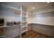 Spacious walk-in closet with ample shelving and storage, offering organization and convenience at 15440 N 54Th St, Scottsdale, AZ 85254