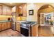 Modern kitchen showcasing stainless steel appliances and custom wood cabinetry at 1614 Palmcroft Sw Dr, Phoenix, AZ 85007