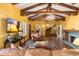 Cozy living room featuring hardwood floors, fireplace and beautiful staircase at 1614 Palmcroft Sw Dr, Phoenix, AZ 85007