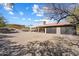 Expansive gravel backyard offers ample space for outdoor activities and potential landscaping projects at 17037 E El Pueblo Blvd, Fountain Hills, AZ 85268