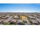 Overhead community view showcasing the neighborhood layout, landscaping, and nearby park with gazebo at 17560 W Desert View Ln, Goodyear, AZ 85338