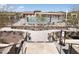 This community offers a gorgeous resort-style pool, lounge seating, covered pergolas, and beautiful mountain views at 17560 W Desert View Ln, Goodyear, AZ 85338