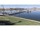 Community lake pier offering seating and views of the water, blending nature and recreation for residents to enjoy at 17560 W Desert View Ln, Goodyear, AZ 85338