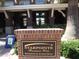 Welcoming entrance to Starpointe Residents Club, with attractive brick facade and manicured landscaping at 17560 W Desert View Ln, Goodyear, AZ 85338