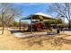 A well-maintained playground with slides and climbing structures for children at 17577 W Desert Bloom St, Goodyear, AZ 85338