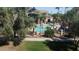 Scenic aerial view of the community pool area with lush landscaping and seating at 18416 N Cave Creek Rd # 2053, Phoenix, AZ 85032