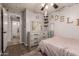 Inviting bedroom featuring a dresser and a comfortable bed at 2106 E 39Th Ave, Apache Junction, AZ 85119