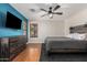 Bright main bedroom with a ceiling fan and a dresser at 2106 E 39Th Ave, Apache Junction, AZ 85119