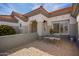 Inviting front porch with a charming table and chairs, ideal for enjoying outdoor meals and relaxing in the sun at 21402 N 158Th Dr, Sun City West, AZ 85375