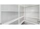 Walk-in pantry featuring shelving for optimal storage at 21978 N 97Th Dr, Peoria, AZ 85383