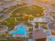 Aerial view of community amenities, including pool, playground, park, and recreation areas at 2215 E La Costa Dr, Gilbert, AZ 85298