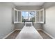 Light bedroom featuring window with shutters and neutral-toned carpet creating a comfortable space at 2215 E La Costa Dr, Gilbert, AZ 85298