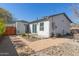 A back yard featuring desert landscaping and rock paths at 2219 N 13Th St, Phoenix, AZ 85006