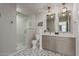 Elegant bathroom with double sinks, a glass shower, and designer tile flooring at 2219 N 13Th St, Phoenix, AZ 85006