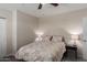 Neutral bedroom featuring a ceiling fan, large window, and stylish decor at 2219 N 13Th St, Phoenix, AZ 85006