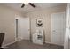 Bedroom featuring a ceiling fan, closet, and a decorative work space at 2219 N 13Th St, Phoenix, AZ 85006