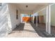 A charming outdoor carport features a brick driveway, wood accents, and covered parking at 2219 N 13Th St, Phoenix, AZ 85006