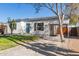 Charming single-story home with a carport and a well-maintained yard at 2219 N 13Th St, Phoenix, AZ 85006