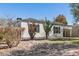 Charming single-story home with a well-manicured yard and unique cacti in a natural desert landscape at 2219 N 13Th St, Phoenix, AZ 85006