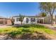 Charming home featuring a well maintained front yard and front lawn at 2219 N 13Th St, Phoenix, AZ 85006