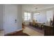 Bright dining room with a modern chandelier, wood floors, a decorative rug, and comfortable seating for Gathering gatherings at 2393 E San Gabriel Trl, Casa Grande, AZ 85194