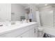 Modern bathroom with double sinks, ample lighting, and a toilet at 25913 W Sands Dr, Buckeye, AZ 85396