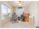 Bright bonus room featuring natural light from large window and a view of the pool outside at 2605 N 115Th Dr, Avondale, AZ 85392