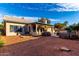 Cozy backyard features a covered patio and desert landscaping, perfect for outdoor entertaining at 2716 N Kristen --, Mesa, AZ 85213