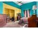 Bedroom featuring yellow and teal walls, vaulted ceilings, and a closet at 2716 N Kristen --, Mesa, AZ 85213