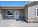 View of a front entrance with decorative brickwork and charming curb appeal at 27227 N 147Th Ave, Surprise, AZ 85387