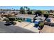 Overhead shot of the home featuring an expansive driveway, verdant landscaping, and a recreational vehicle at 2919 W Kerry Ln, Phoenix, AZ 85027