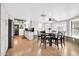 Bright dining area with a modern table and an abundance of natural light at 2919 W Kerry Ln, Phoenix, AZ 85027