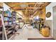 Spacious garage interior, featuring organized shelving, tools, and ample workspace for projects at 2919 W Kerry Ln, Phoenix, AZ 85027