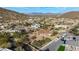 Stunning aerial view showcasing a desert community with mountain backdrops and varied landscaping at 2924 W Here To There Dr, Phoenix, AZ 85086