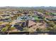 Gorgeous aerial view of an expansive property featuring mature landscaping and a large private pool at 2924 W Here To There Dr, Phoenix, AZ 85086