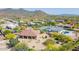 Beautiful aerial view of a desert neighborhood with stunning mountain views and mature landscaping at 2924 W Here To There Dr, Phoenix, AZ 85086