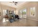 A main bedroom featuring a canopy bed, stylish chair, and an abundance of natural light at 2924 W Here To There Dr, Phoenix, AZ 85086