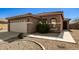 Charming single-story home with a two-car garage and well-maintained landscaping at 2977 W Mira Dr, San Tan Valley, AZ 85144