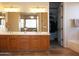 Bathroom boasts double sink vanity and a glimpse into the walk-in closet at 3007 W Jordon Ln, Phoenix, AZ 85086