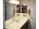 Bathroom features a double sink vanity and a large mirror, providing ample space at 3007 W Jordon Ln, Phoenix, AZ 85086