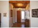 Welcoming entryway featuring decorative ceilings, stylish tile flooring, and a rustic wood front door at 3007 W Jordon Ln, Phoenix, AZ 85086