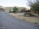 Charming desert home with a gravel driveway and native desert vegetation at 3007 W Jordon Ln, Phoenix, AZ 85086