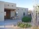 Inviting home exterior with a charming desert landscape, lovely fountain, and Southwestern design elements at 3007 W Jordon Ln, Phoenix, AZ 85086