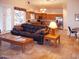 Bright living room featuring an open layout, tile flooring, and access to the kitchen at 3007 W Jordon Ln, Phoenix, AZ 85086