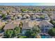 Community aerial view featuring a mix of well-maintained homes, green spaces, and neighborhood amenities at 330 W Locust Dr, Chandler, AZ 85248