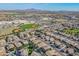 Community aerial view of a neighborhood featuring baseball fields, shopping centers, and well-maintained homes at 330 W Locust Dr, Chandler, AZ 85248