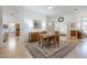 Charming dining room with wood table, chairs, rug and decorative accents at 330 W Locust Dr, Chandler, AZ 85248